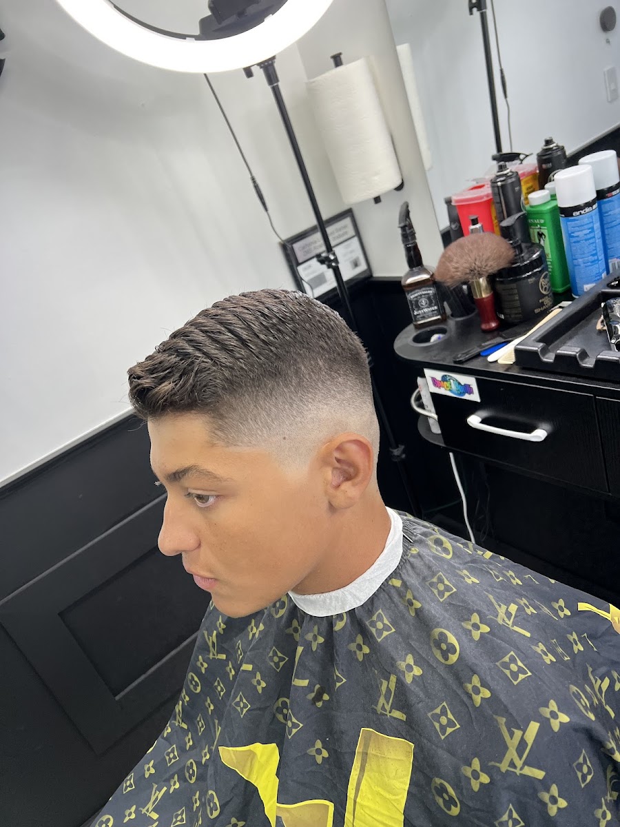 Fade detail with the signature LV-pattern cape