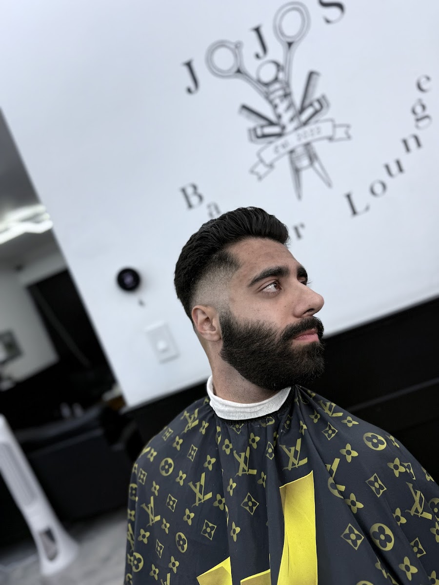 Editorial profile of a haircut and full beard work